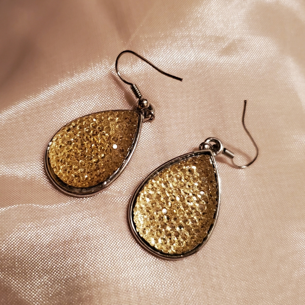 Silver plated earrings with light yellow stones